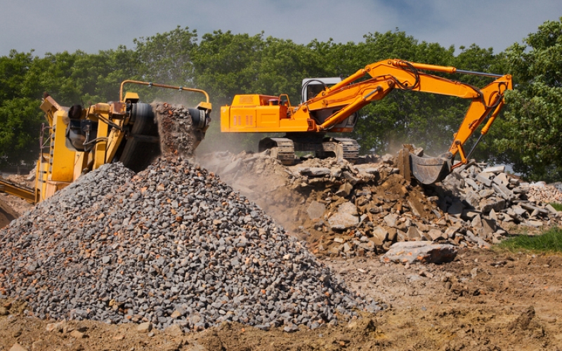 Stone crusher and crane